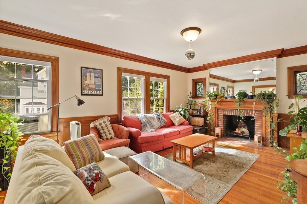 3 Clark Road Brookline, MA 02445 - Photo 3 of 24 a living room with furniture fireplace and flat screen tv