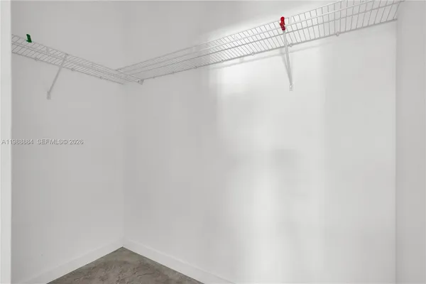 a view of a room with racks on the wall