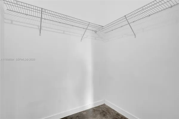 a view of a room with racks on the wall