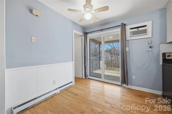 a kitchen with a refrigerator a sink and cabinets