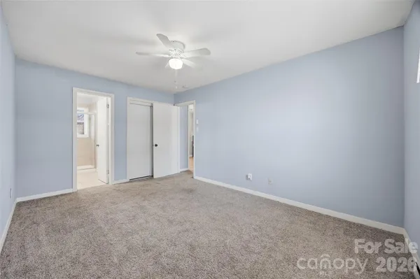a view of balcony with wooden floor