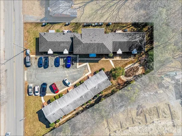 an aerial view of residential house with outdoor space