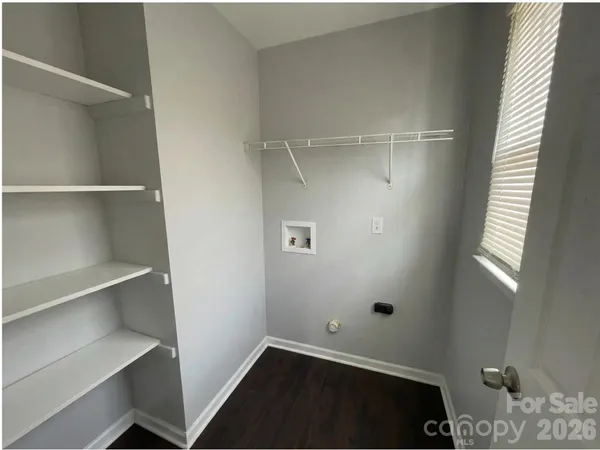 a view of an empty walk in closet