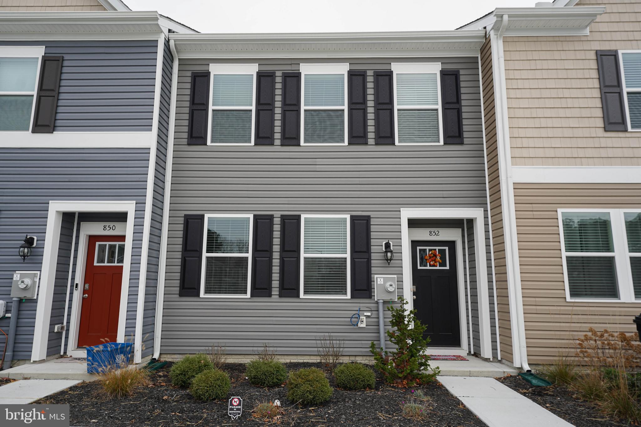 852 Mersey Lane Salisbury, MD 21801 - Photo 1 of 40 a front view of a house with a yard