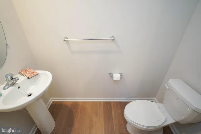 a view of a storage room with a sink and furniture