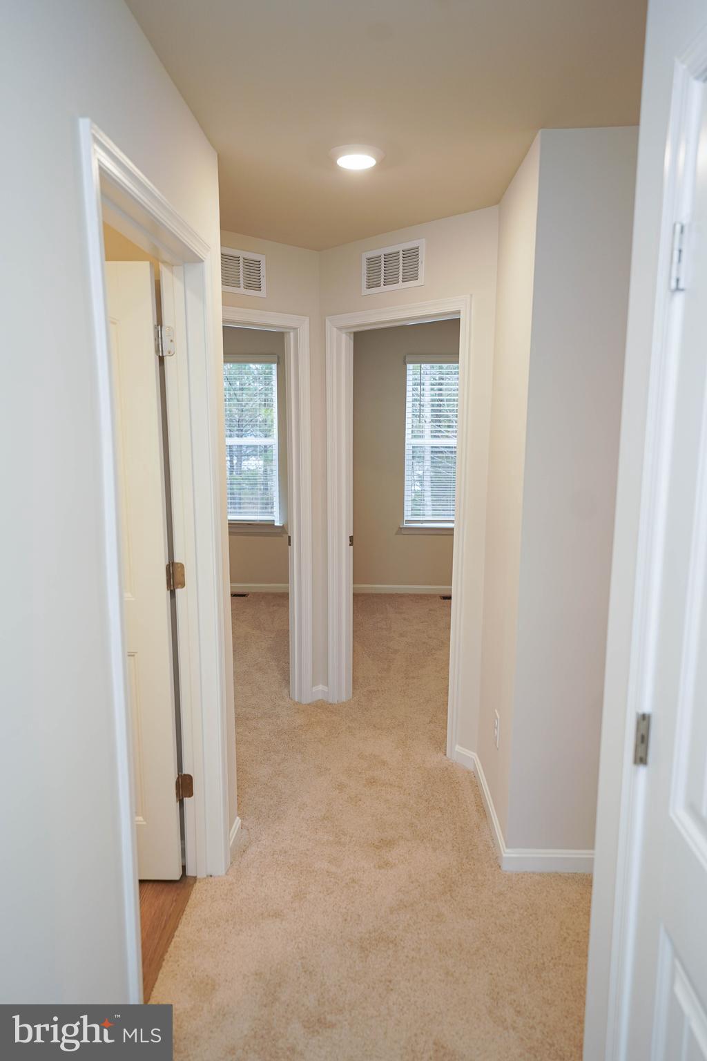 852 Mersey Lane Salisbury, MD 21801 - Photo 20 of 40 a view of a hallway with wooden floor and closet