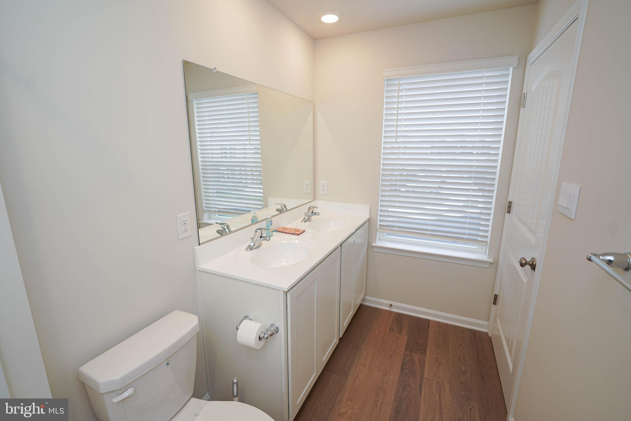 852 Mersey Lane Salisbury, MD 21801 - Photo 27 of 40 a bathroom with a sink a toilet and shower
