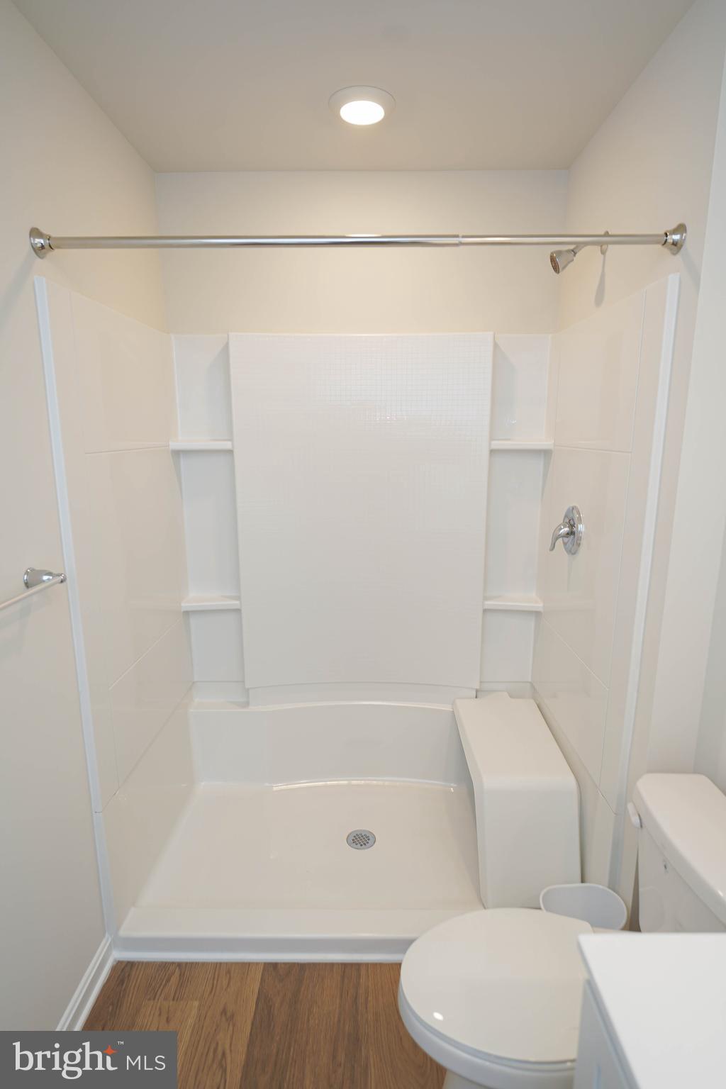 852 Mersey Lane Salisbury, MD 21801 - Photo 28 of 40 a bathroom with a bathtub and a shower