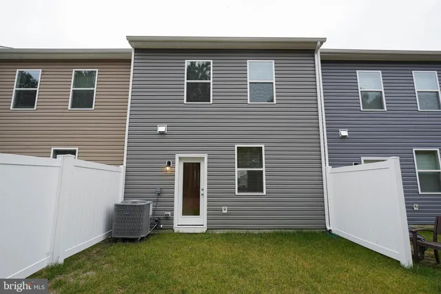 a view of outdoor space and yard from deck