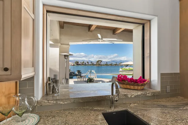 a bathroom with a sink a mirror and a shower