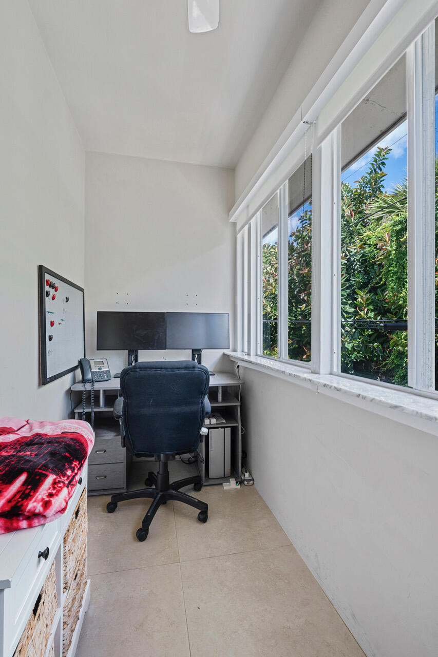 5505 North Ocean Boulevard, Unit 3203 Ocean Ridge, FL 33435 - Photo 14 of 25 a view of a workspace with furniture and a window