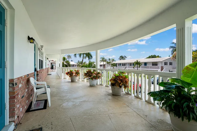 a view of a chairs and tables in patio
