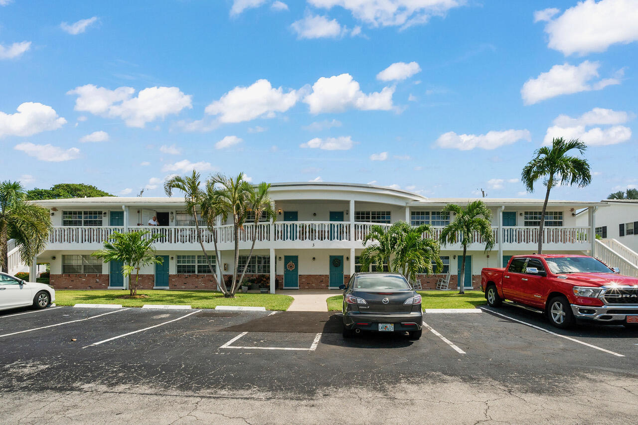 5505 North Ocean Boulevard, Unit 3203 Ocean Ridge, FL 33435 - Photo 23 of 25 a car parked in front of a house