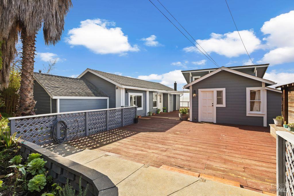 34 Sandy Beach Road Vallejo, CA 94590 - Photo 7 of 63 a front view of house with yard outdoor seating and barbeque oven