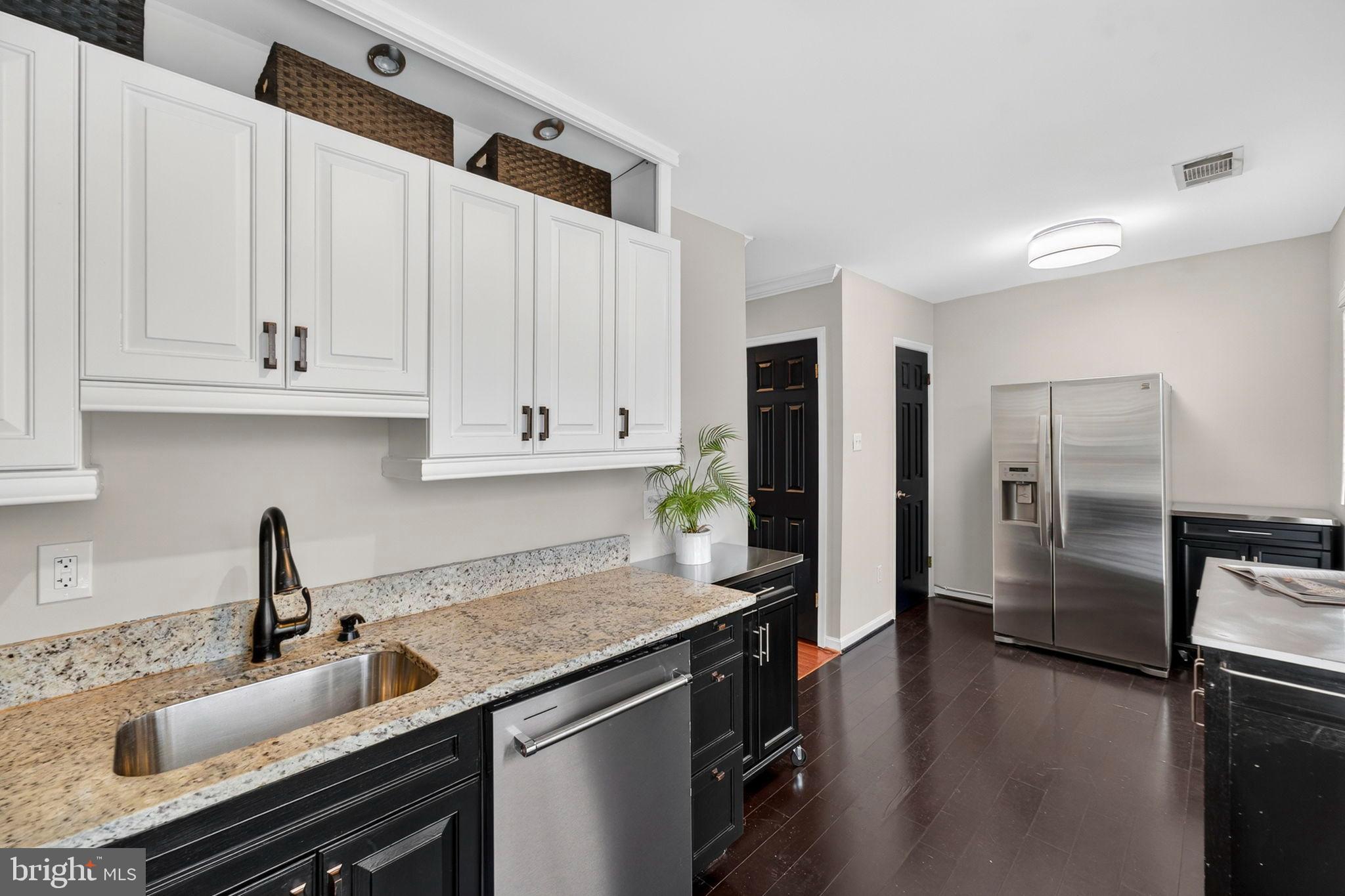 1117 G Street Southeast Washington, DC 20003 - Photo 13 of 50 Modern kitchen with sleek finishes.