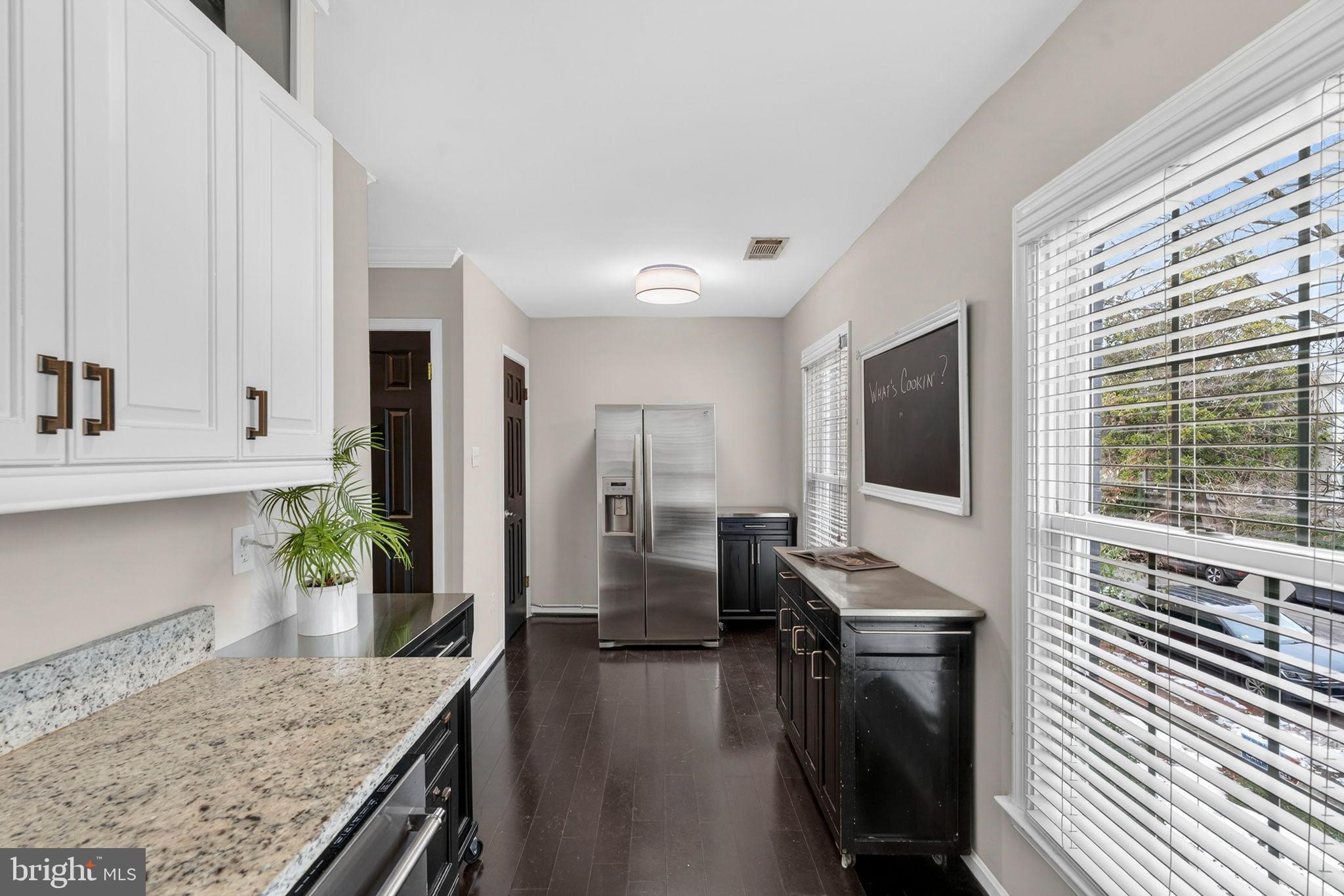 1117 G Street Southeast Washington, DC 20003 - Photo 14 of 50 Modern kitchen with sleek finishes.