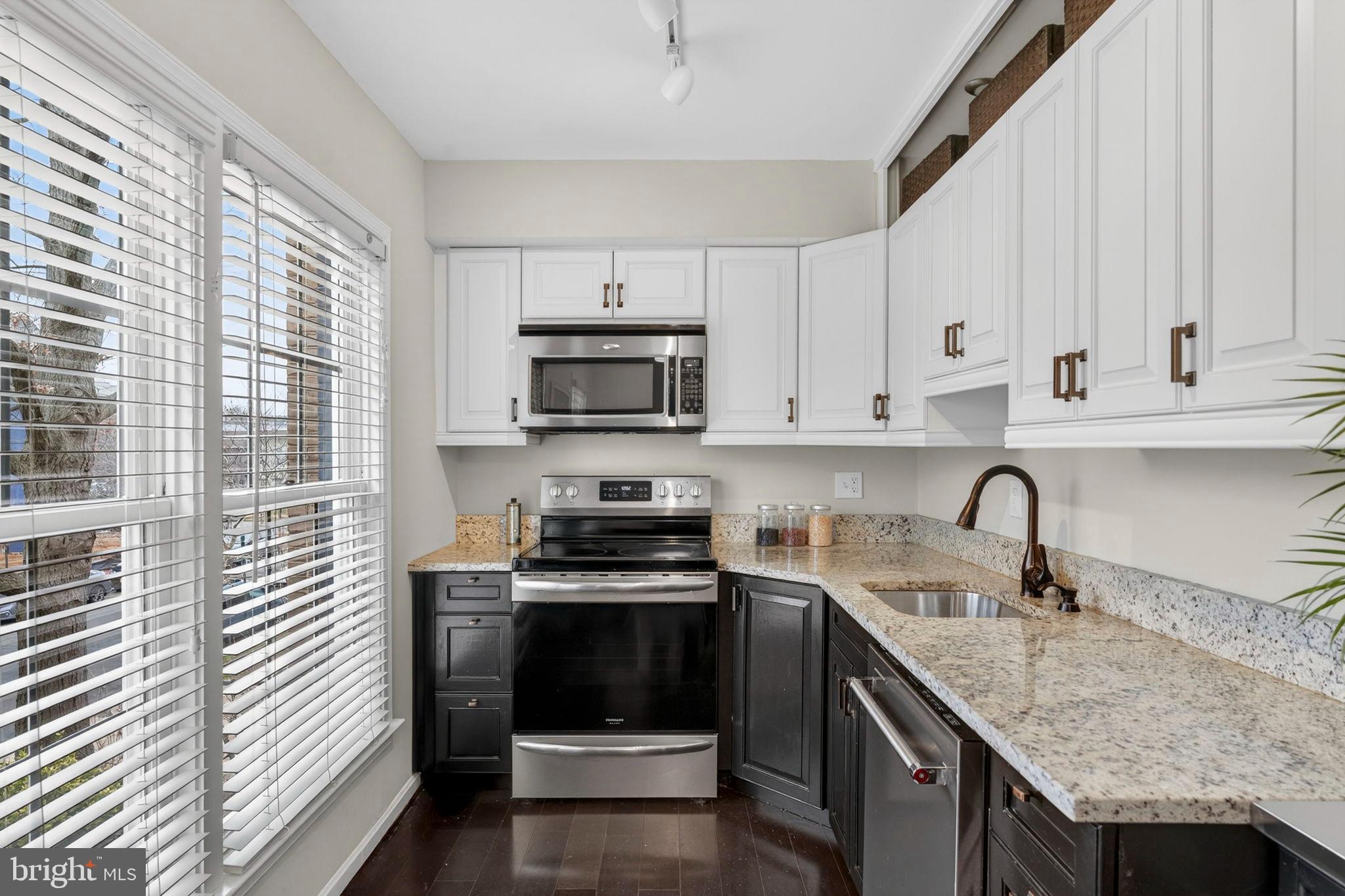 1117 G Street Southeast Washington, DC 20003 - Photo 15 of 50 Modern kitchen with sleek finishes.