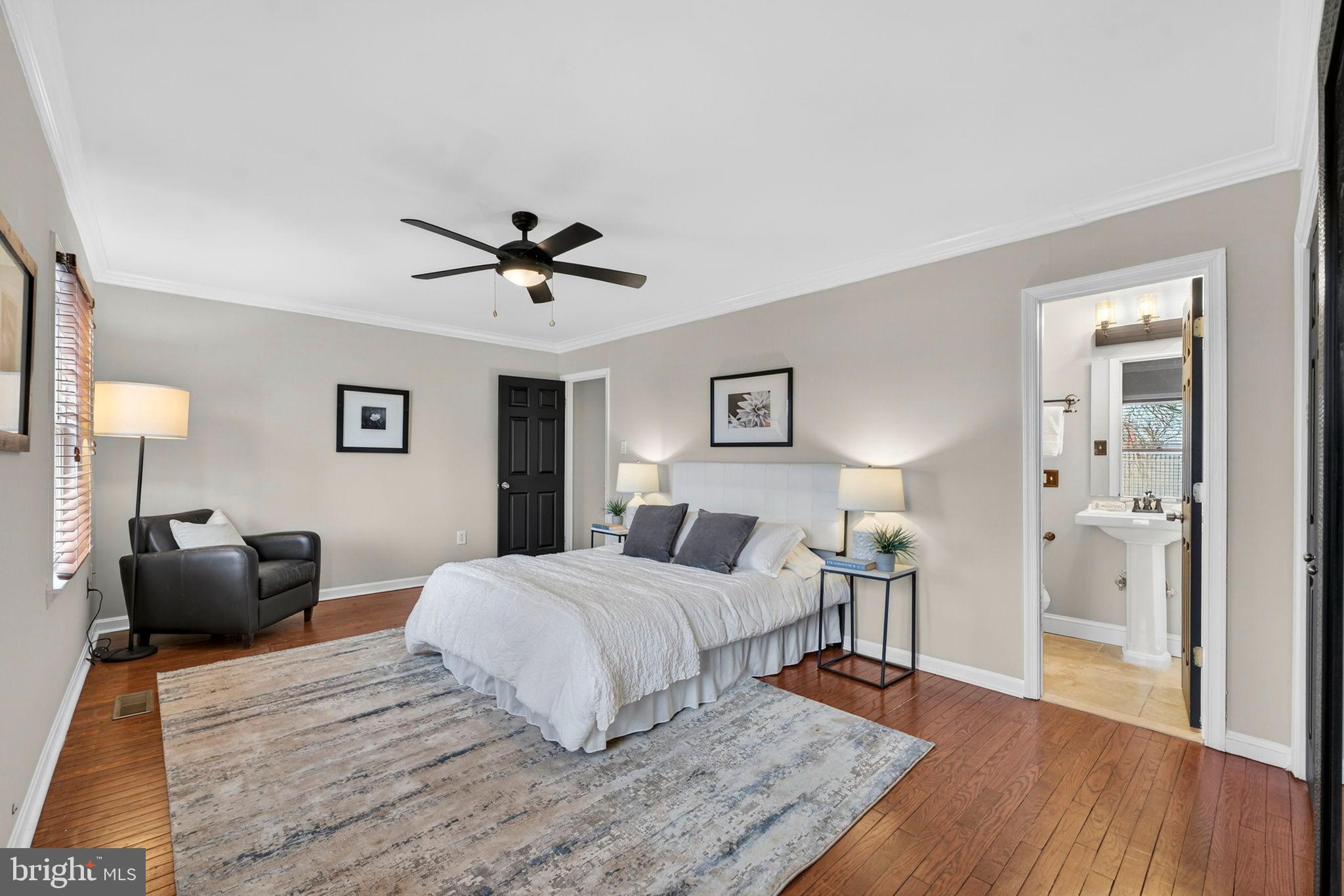 1117 G Street Southeast Washington, DC 20003 - Photo 23 of 50 Spacious bedroom with modern elegance.