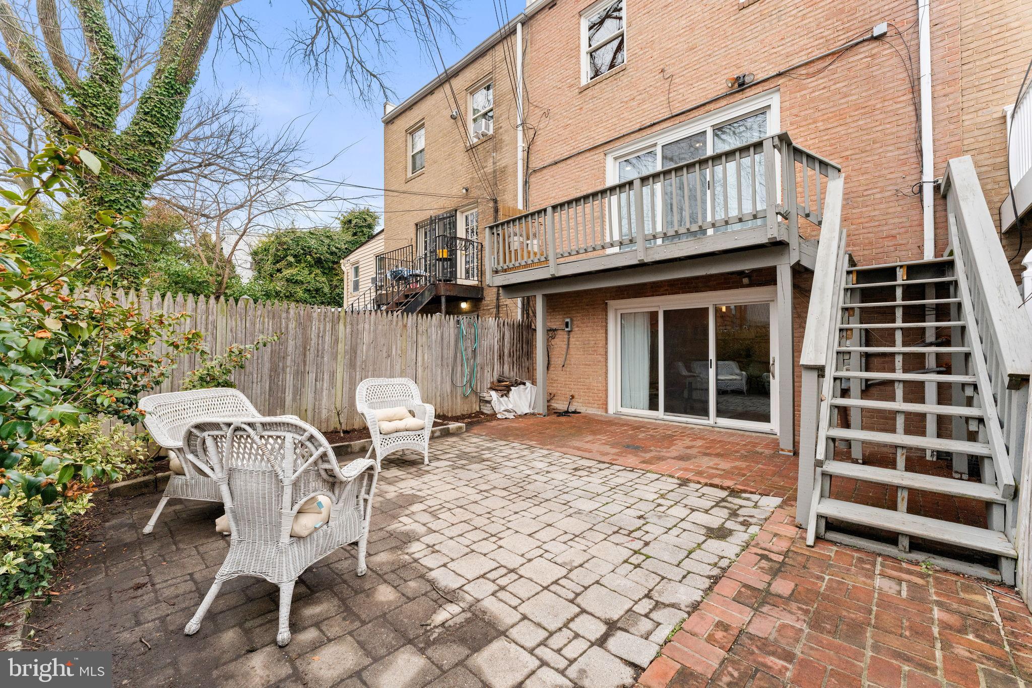 1117 G Street Southeast Washington, DC 20003 - Photo 39 of 50 Charming patio retreat with lush greenery.
