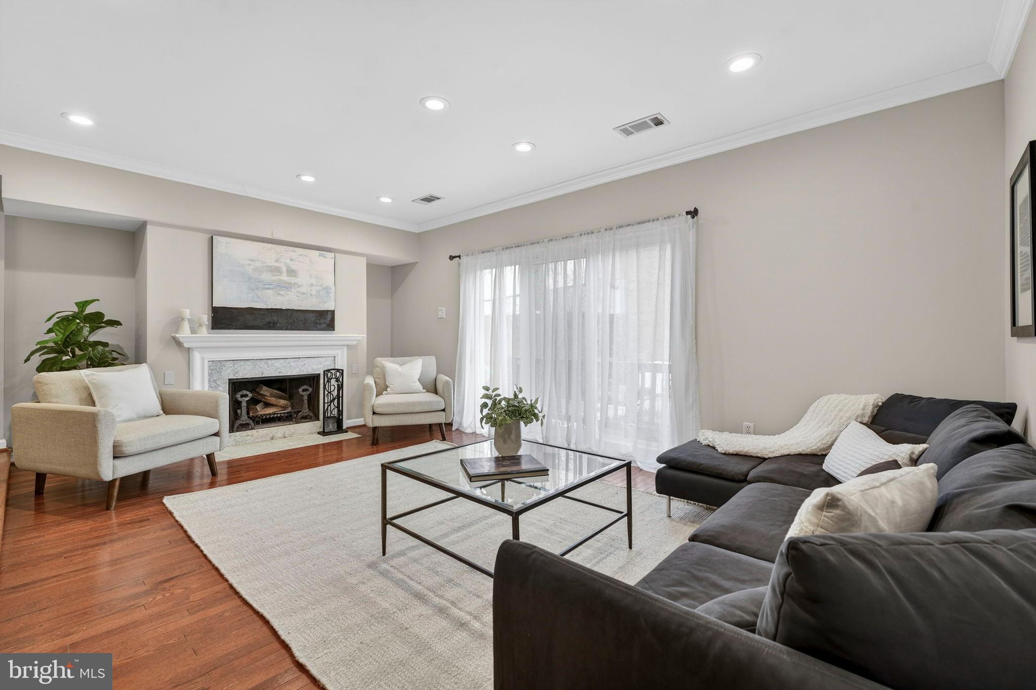 1117 G Street Southeast Washington, DC 20003 - Photo 6 of 50 Spacious living area with natural light.