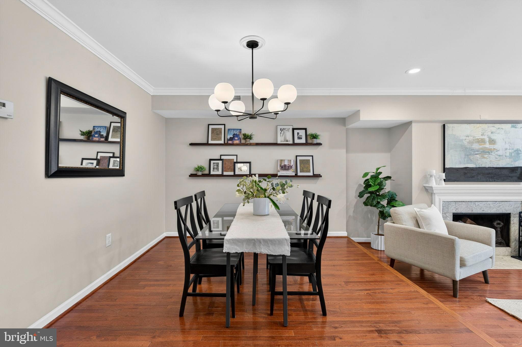 1117 G Street Southeast Washington, DC 20003 - Photo 8 of 50 Elegant dining space with warm wood tones.