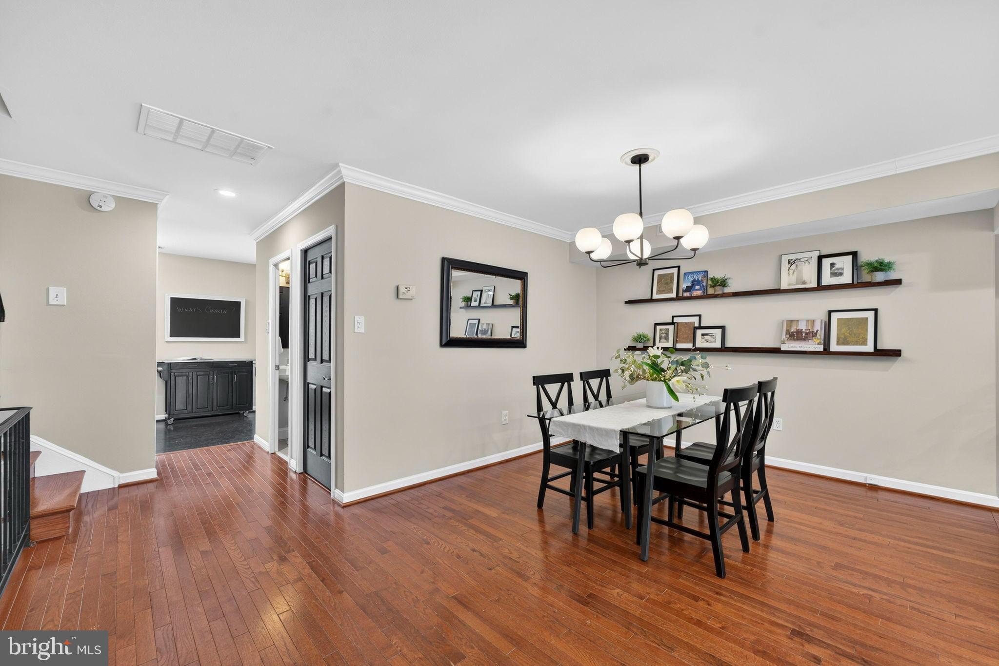 1117 G Street Southeast Washington, DC 20003 - Photo 9 of 50 Inviting dining space with warm wood floors.
