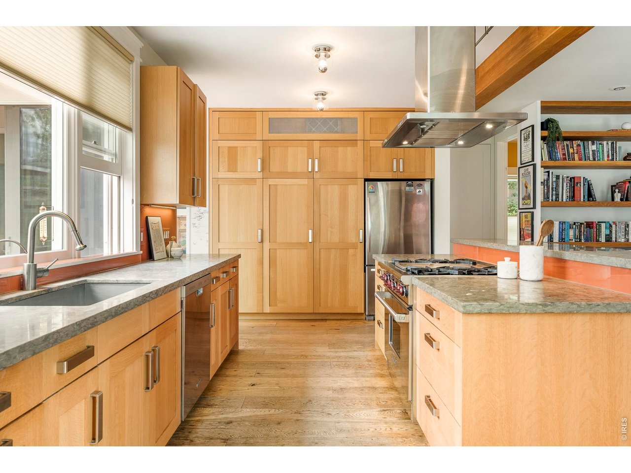 3231 11th Street Boulder, CO 80304 - Photo 19 of 39 a kitchen with stainless steel appliances granite countertop a sink and a refrigerator