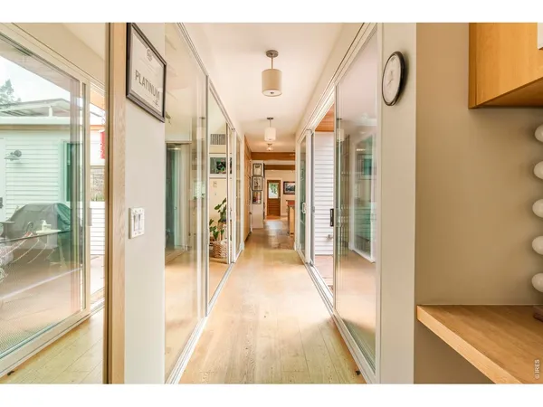 a bedroom with a bed and a night stand