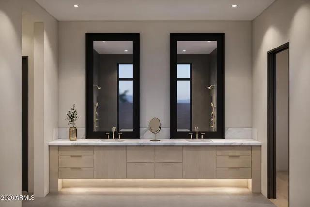 a bathroom with mirror and window
