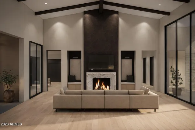 a living room with furniture and a fireplace