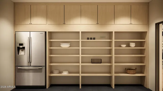 a refrigerator freezer sitting in a kitchen