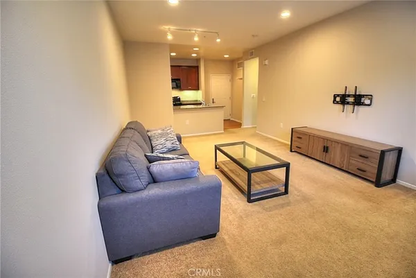 a living room with furniture and a couch