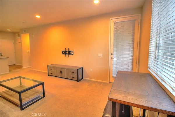 a living room with a couch and a table