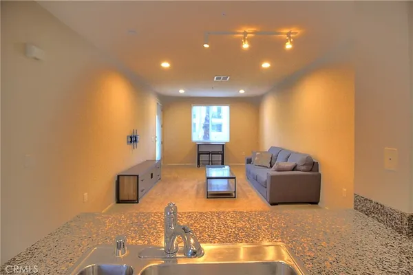 a living room with furniture and a couch