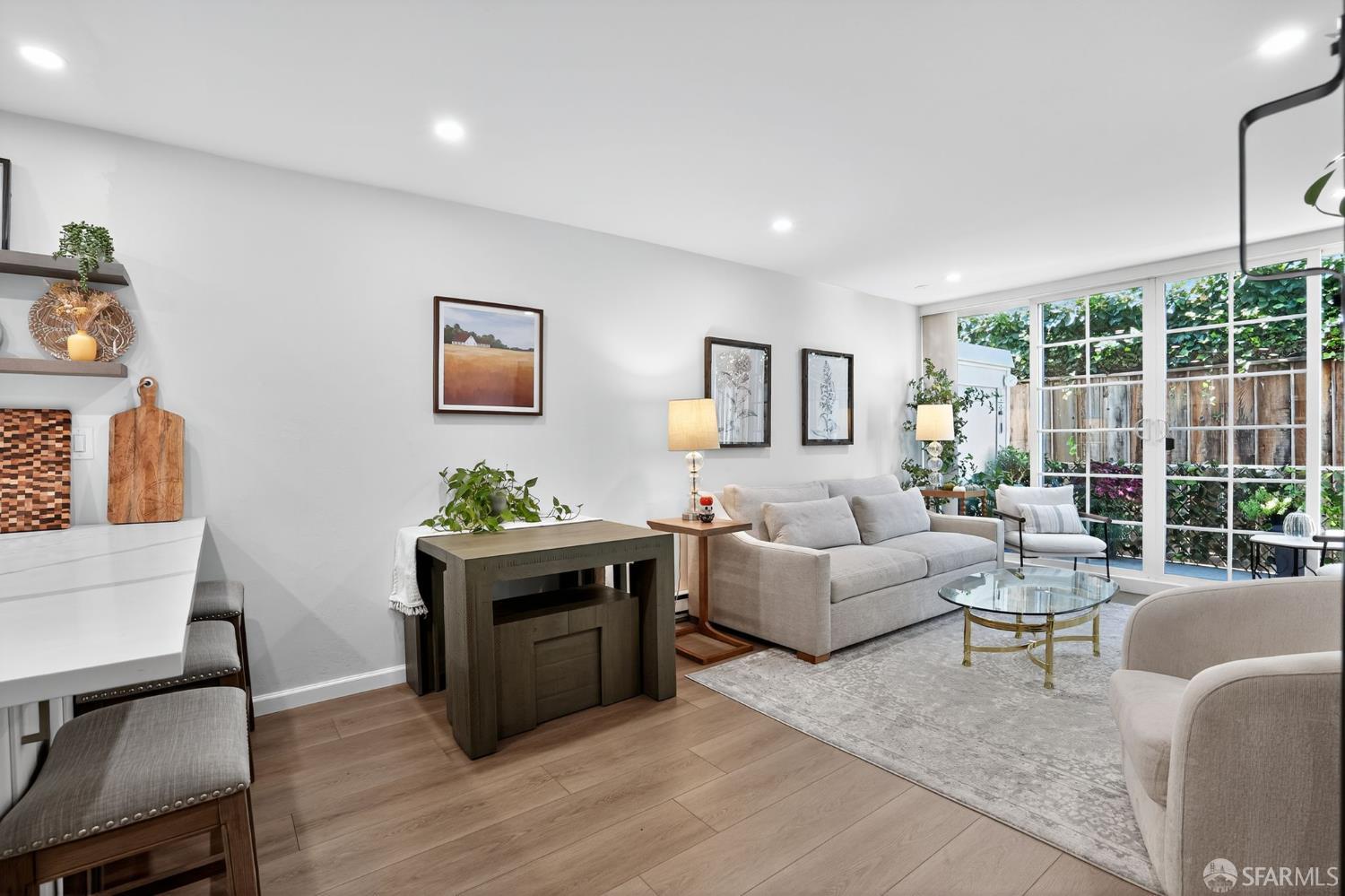 222 Laurel Street, Unit 109 San Carlos, CA 94070 - Photo 14 of 27 a living room with furniture and a large window
