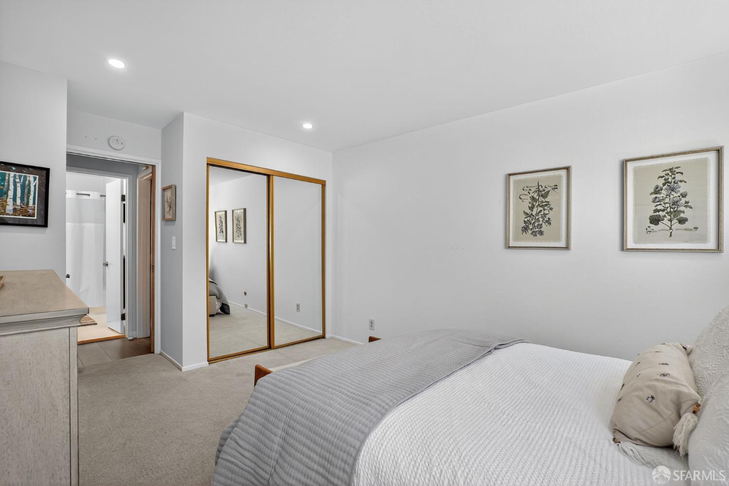 222 Laurel Street, Unit 109 San Carlos, CA 94070 - Photo 19 of 27 a bedroom with a bed and hallway