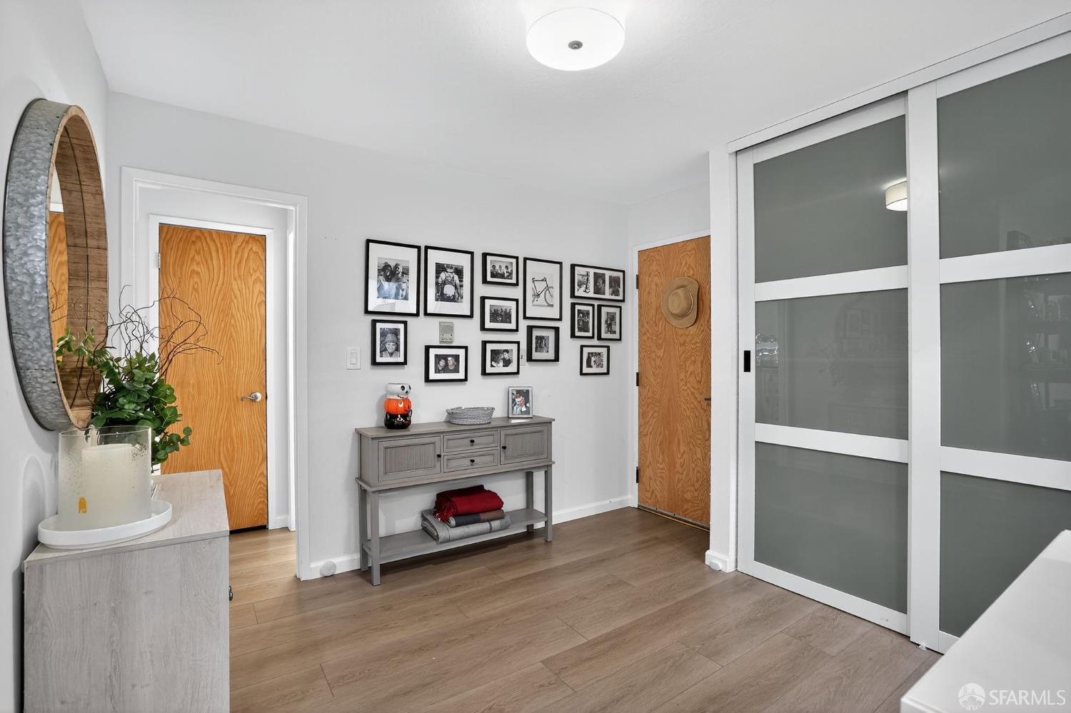 222 Laurel Street, Unit 109 San Carlos, CA 94070 - Photo 4 of 27 a view of an empty room with a fireplace and a window