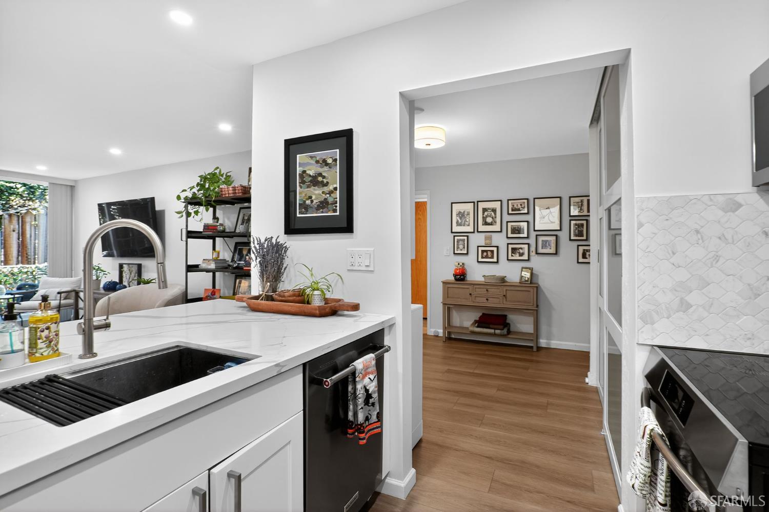 222 Laurel Street, Unit 109 San Carlos, CA 94070 - Photo 6 of 27 a kitchen with a refrigerator and a stove top oven