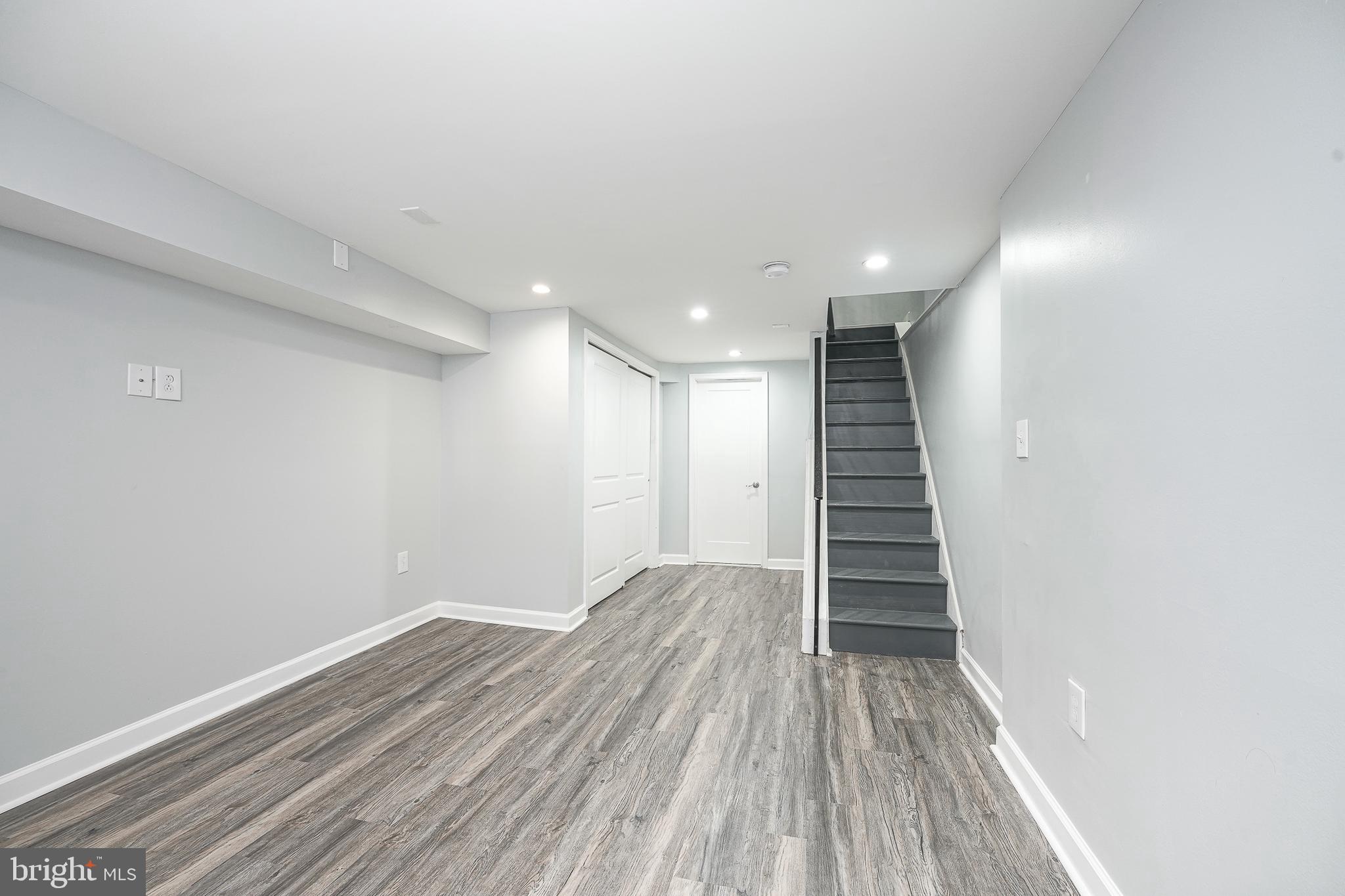 1920 Fitzgerald Street Philadelphia, PA 19145 - Photo 11 of 25 a view of hallway with stairs and wooden floor