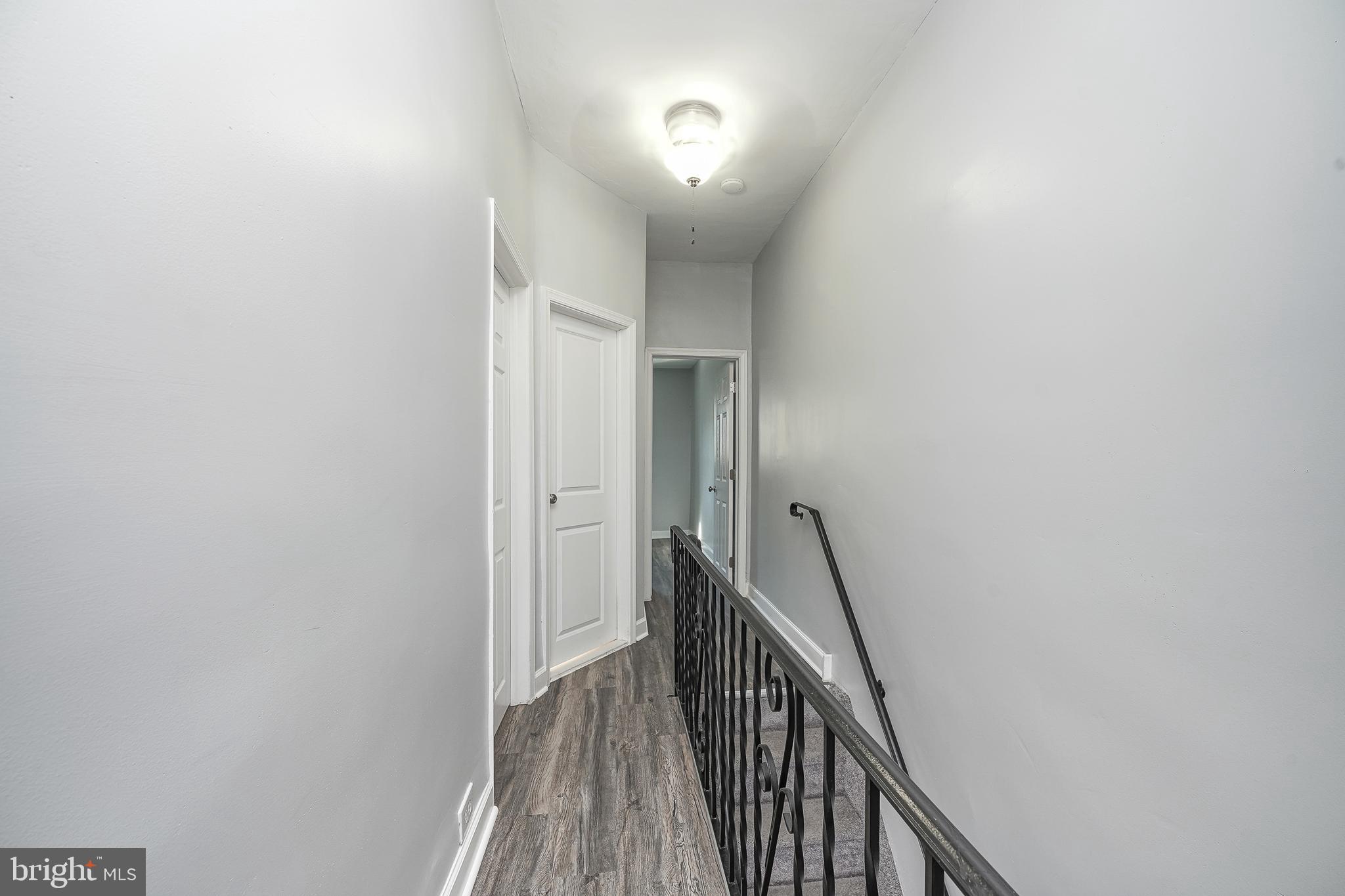 1920 Fitzgerald Street Philadelphia, PA 19145 - Photo 25 of 25 a view of a hallway with wooden floor