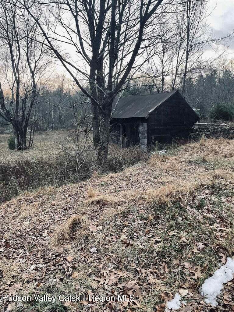 182 Otens Road Ellenville, NY 12428 - Photo 4 of 8 a front view of a house with a yard