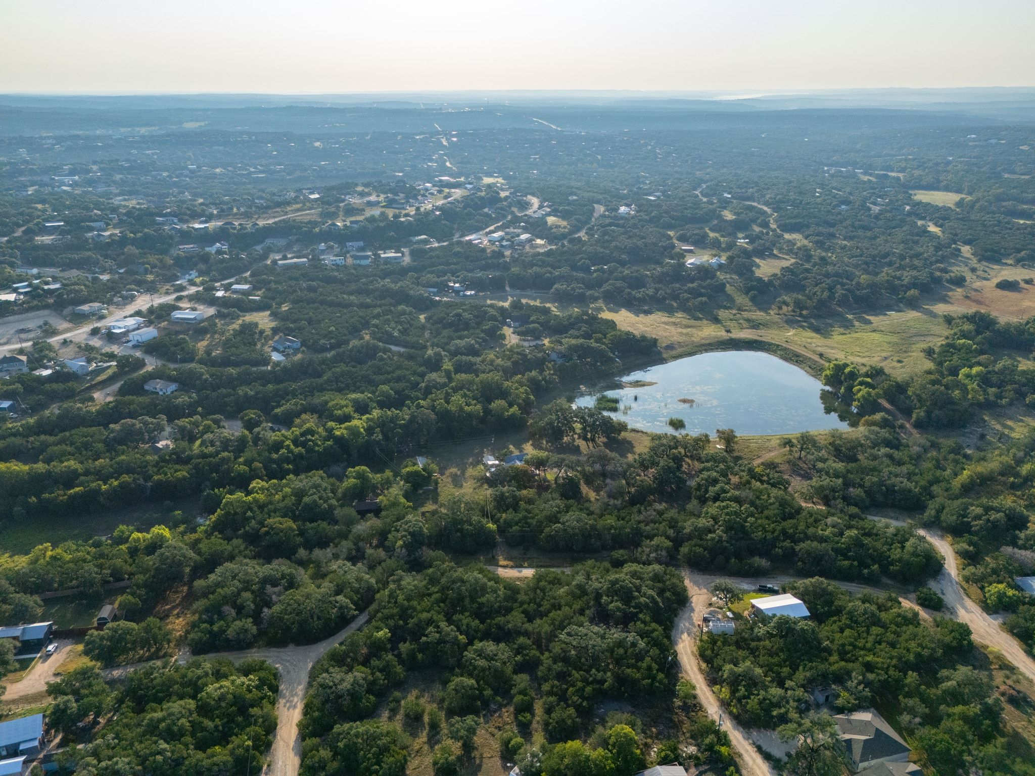 195 Hill Drive Spring Branch, TX 78070 - Photo 2 of 10 an aerial view of residential house and green space