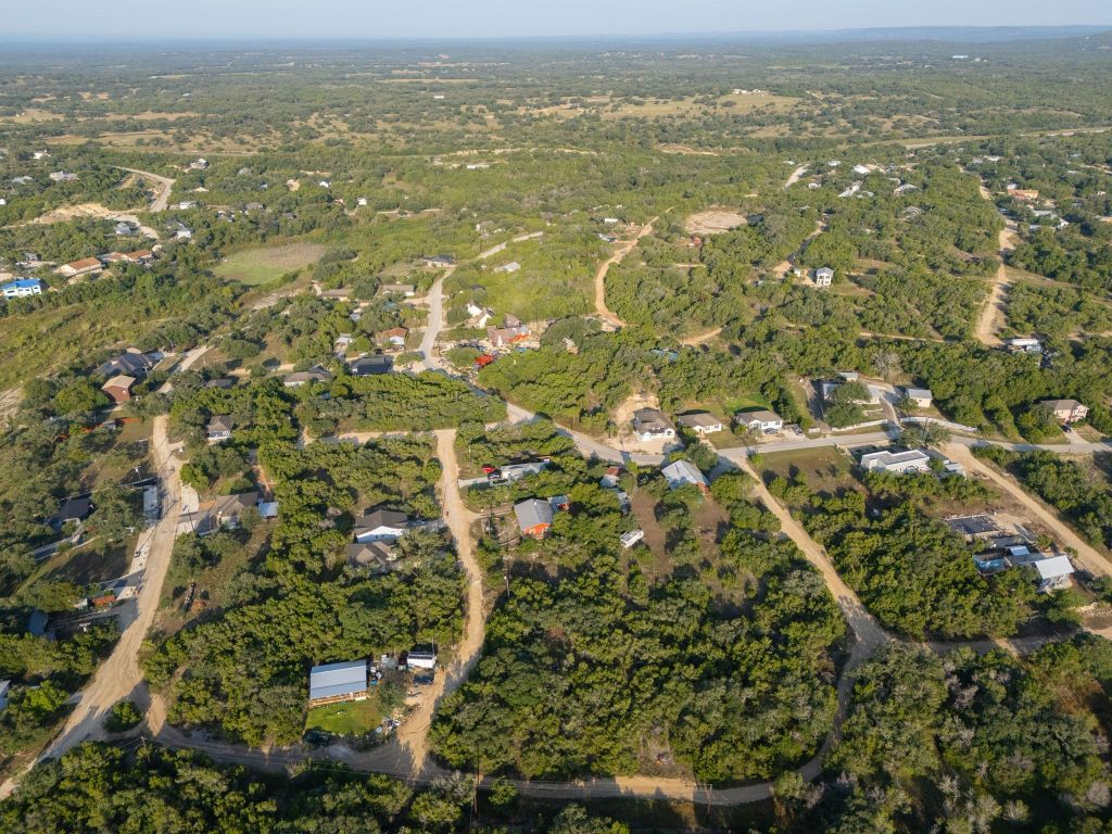 195 Hill Drive Spring Branch, TX 78070 - Photo 4 of 10 an aerial view of residential houses with outdoor space and trees
