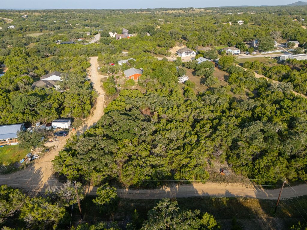 195 Hill Drive Spring Branch, TX 78070 - Photo 8 of 10 an aerial view of residential houses with outdoor space and trees