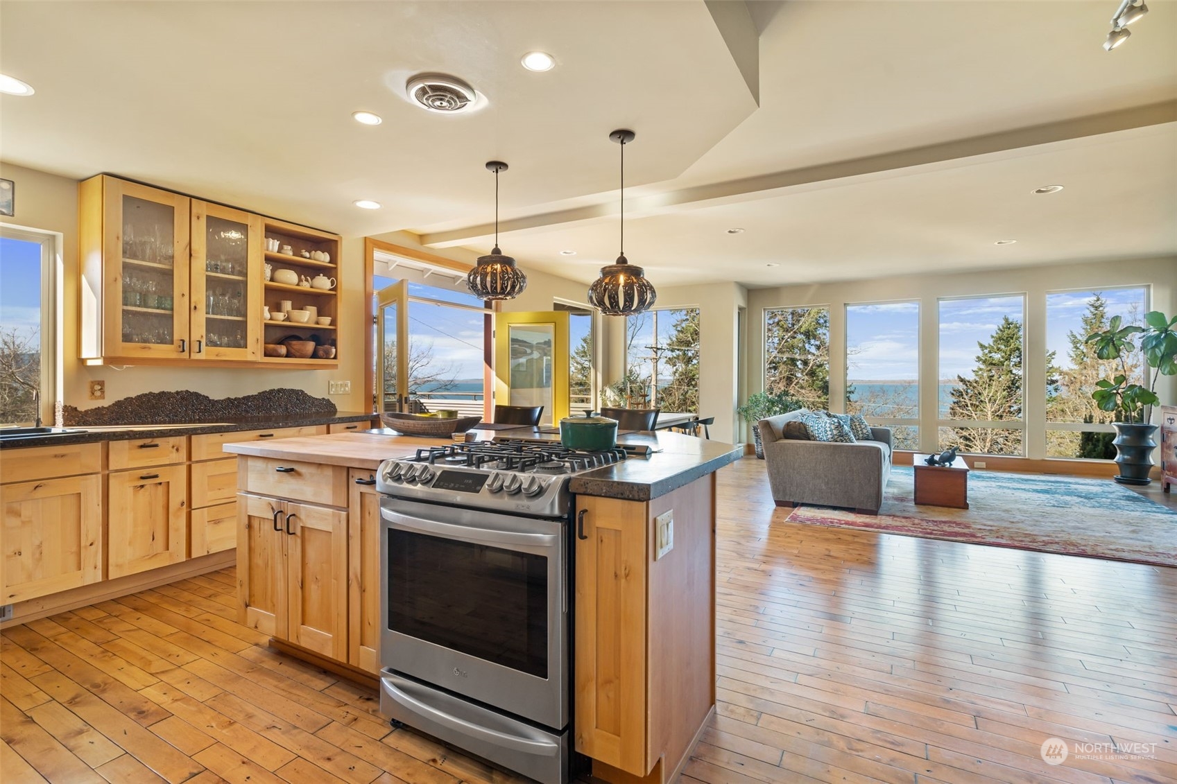 341 South State Street Bellingham, WA 98225 - Photo 7 of 40 a open kitchen with sink stove and wooden floor