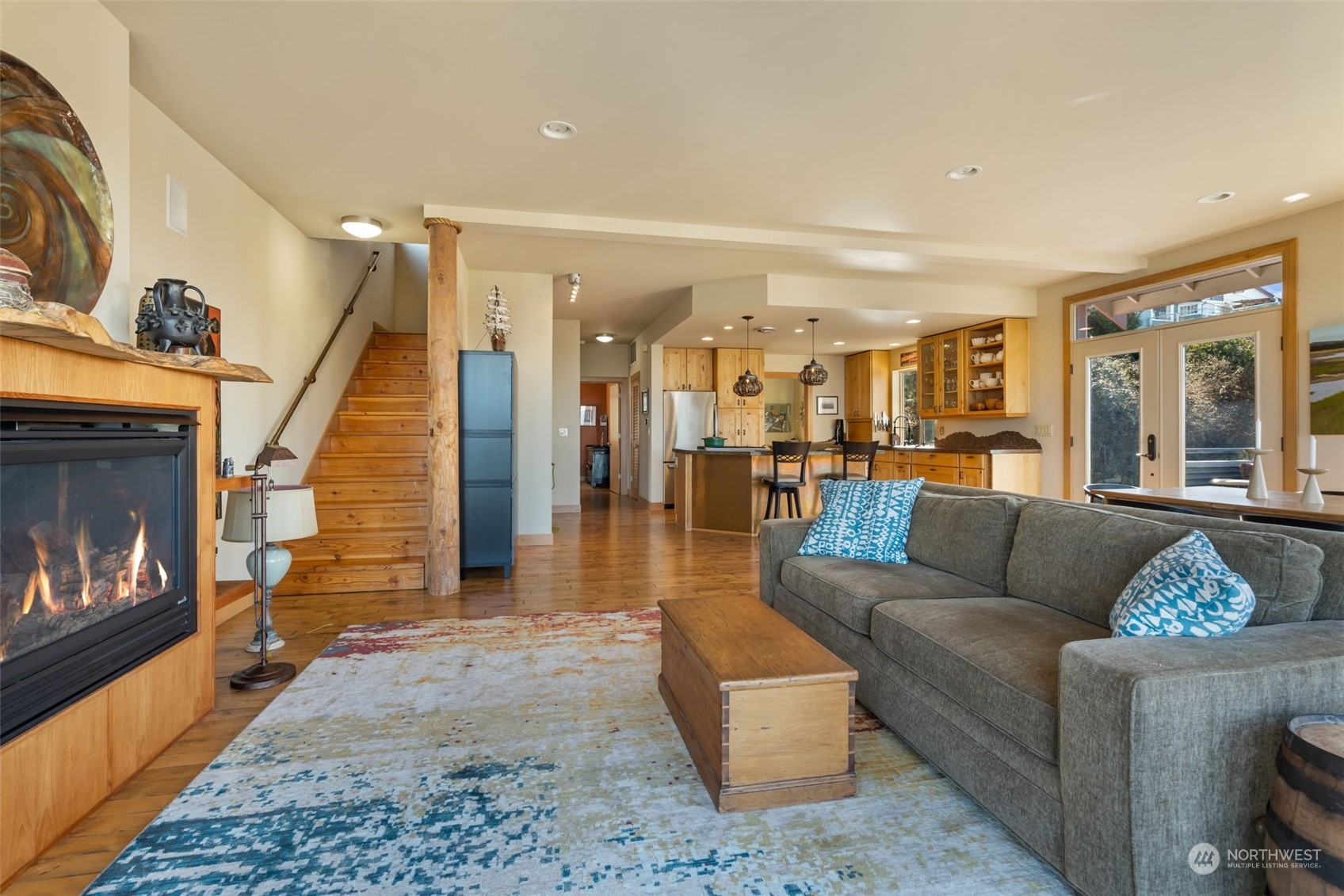 341 South State Street Bellingham, WA 98225 - Photo 9 of 40 a living room with furniture and a fireplace