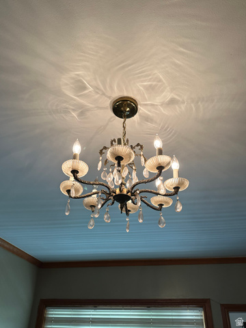 8320 West 3100th Street South Magna, UT 84044 - Photo 34 of 41 Detailed view of suspended lighting and ornamental molding