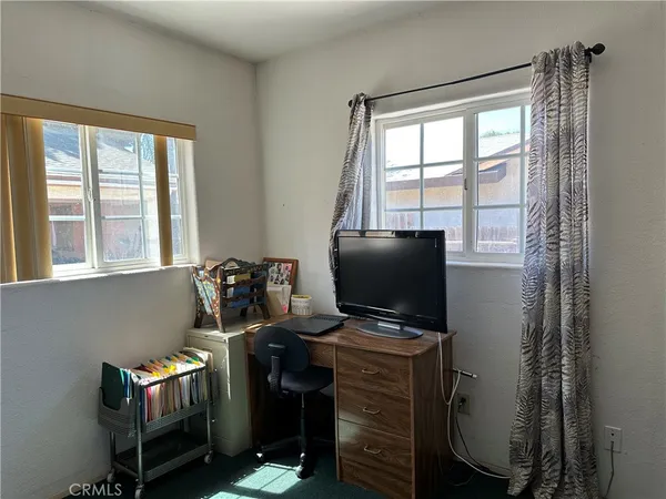 a view of hallway with livingroom and bedroom