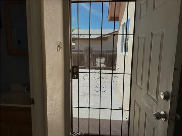 a backyard of a house with garage