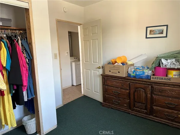 a room with furniture and flat screen tv
